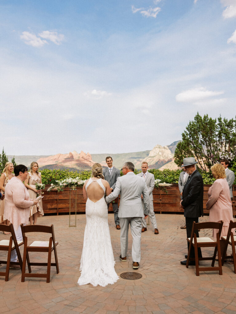 bride with dad walking down the aisle Agave of Sedona